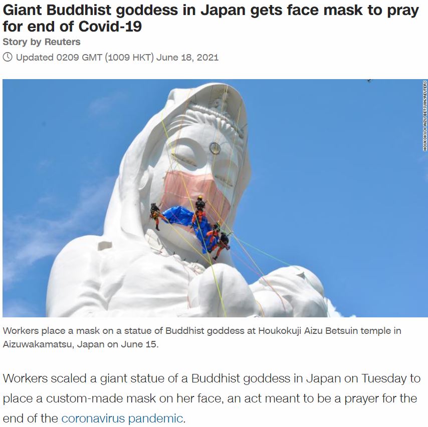 Buddhist Statue gets a Slave Mask in Mocking Ritual